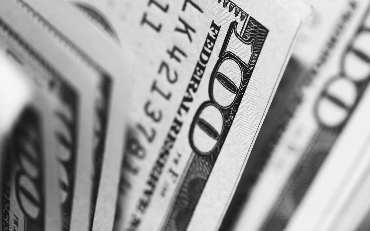 closeup of $100 bills closeup of $100 bills