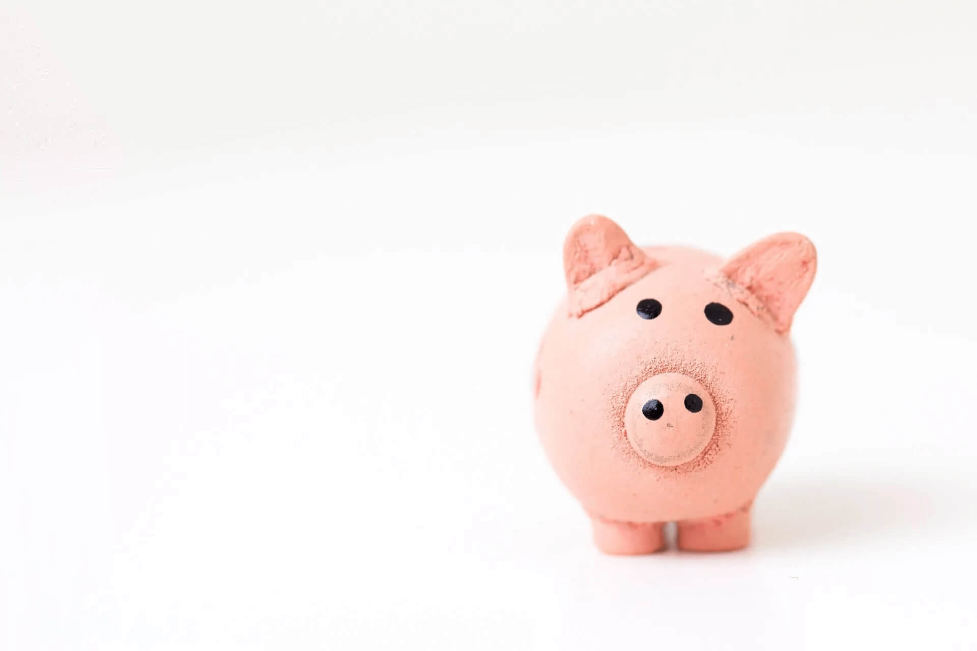 photo-1459257831348-f0cdd359235f-1920w piggy bank